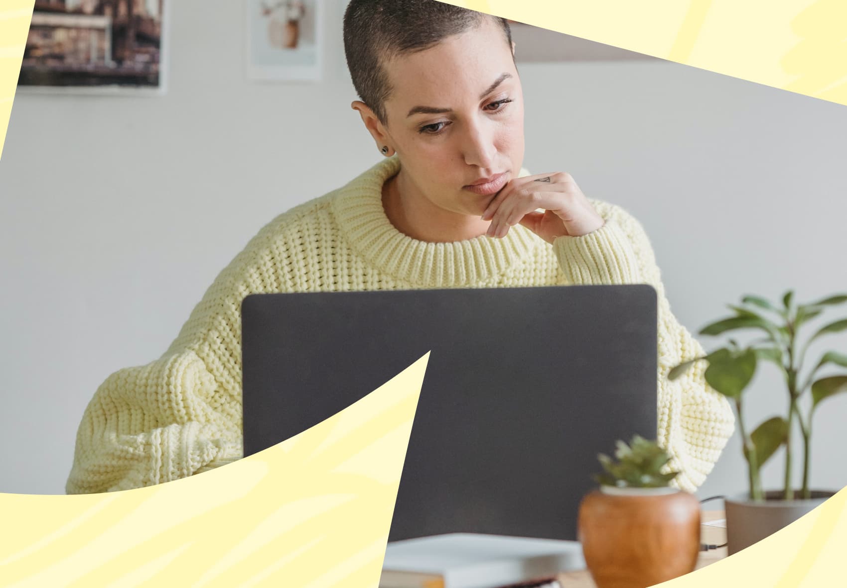 Person sitting in front of a laptop