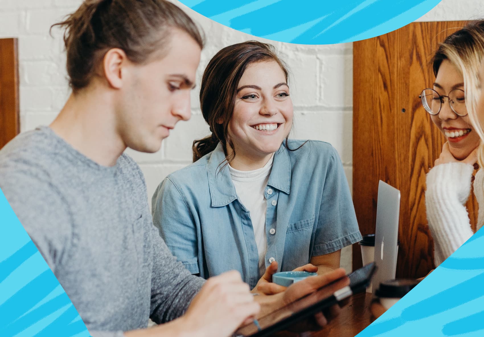 Group of coworkers sitting a table