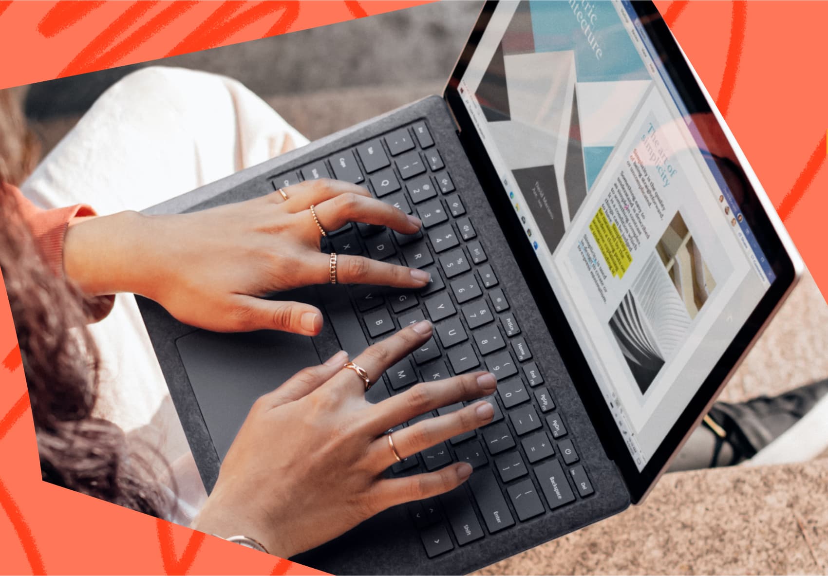 Two hands on laptop typing